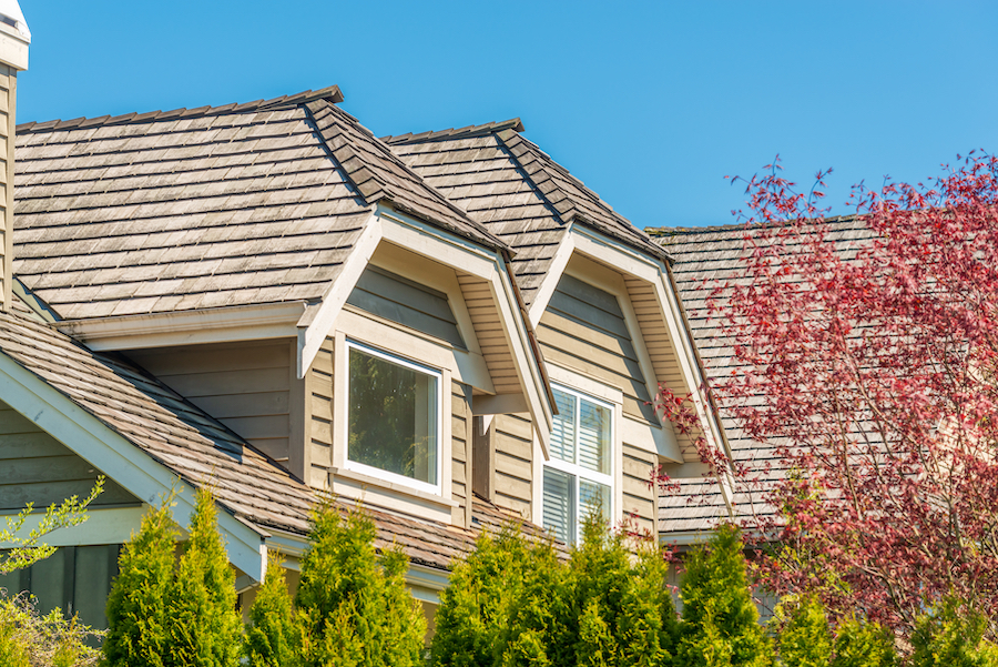 Home with pristine shingle roof.