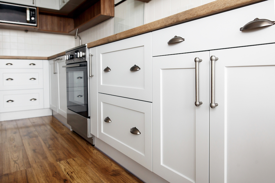 Modern White Kitchen Cabinetry with Wooden Countertops