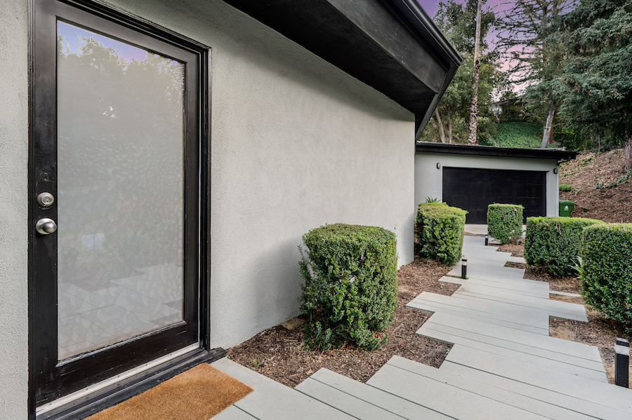Landscaped Walkway Leading to a Modern Suburban Home