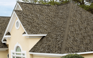 New asphalt shingle roof installed on a modern single-family home